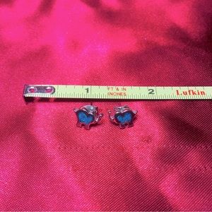 Cute small sterling silver and turquoise elephant stud earrings.